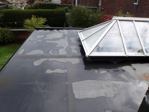 Flat roof with window light in Sandbach.